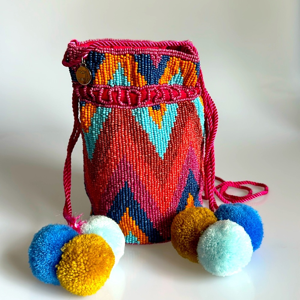 From St Xavier Pom pom Pink String Bag